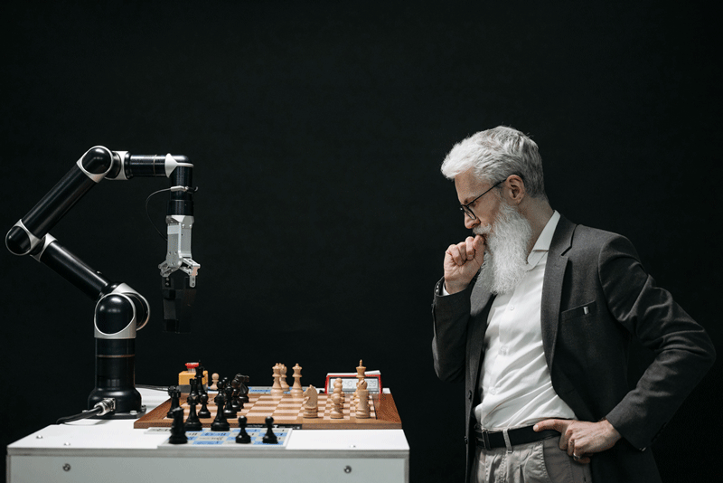 Robot Arm Playing Chess with a Human